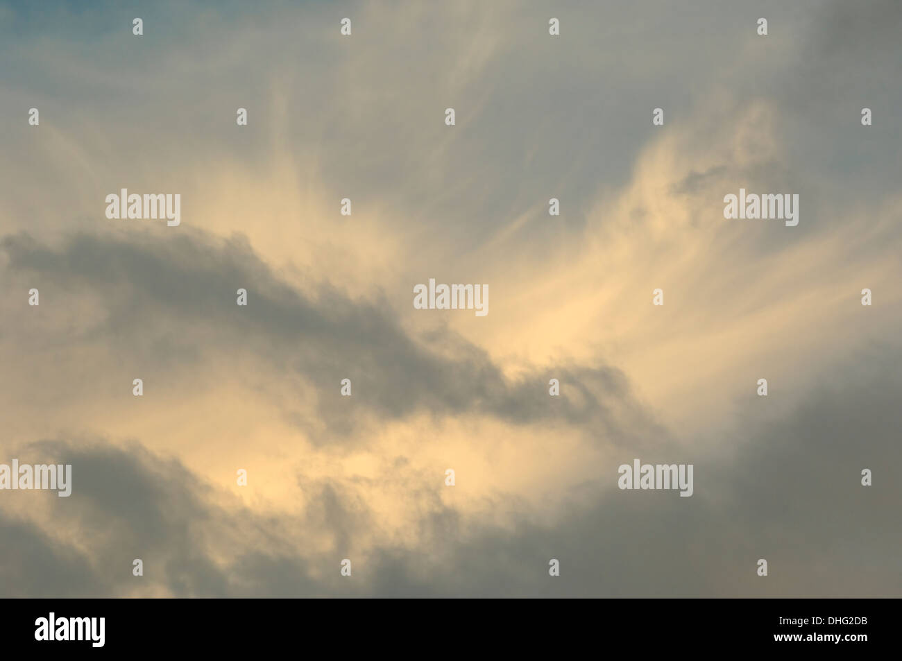 Soft stratus and cumulus clouds just before sunset. Stock Photo