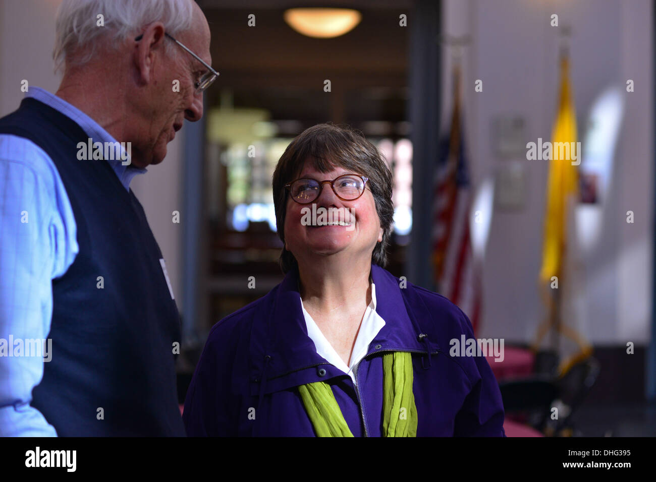 Washington DC, USA. 9 November 2013. Peter A Stone, from the Michiana Movement to Abolish the Death Penalty in Indiana, in Shipshewana, IN, talks to Sister HELEN PREJEAN, during a conference on opposition to the death penalty called ''Where Justice and Mercy Meet'' hosted by the Catholic University of America and the Columbus School of Law. Sister Prejean, a member of the Congregation of St. Joseph was portrayed in the ''Dead Man Walking'' movie. She has accompanied six men to their deaths, the first was PATRICK SONNIER, the inspiration for her book. (Credit Image: © Miguel J Stock Photo