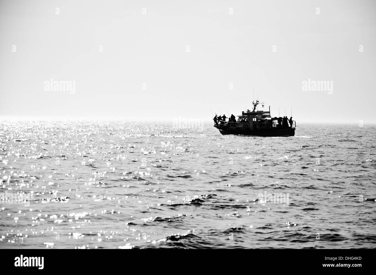 boat at sea black and white Stock Photo - Alamy