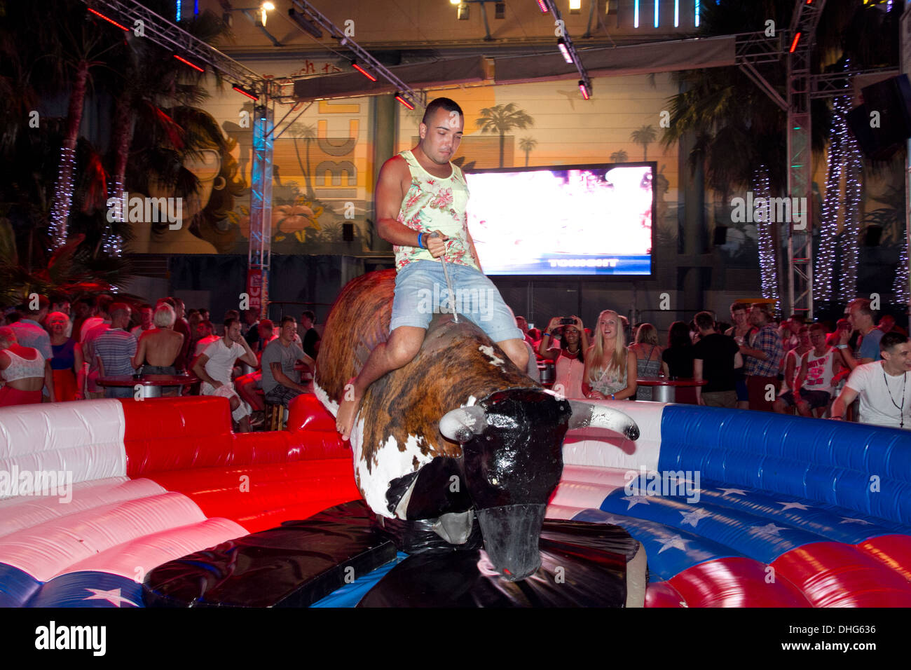 British young nightlife mechanical bull at BCM disco in Magaluf Mallorca Balearic islands Stock Photo