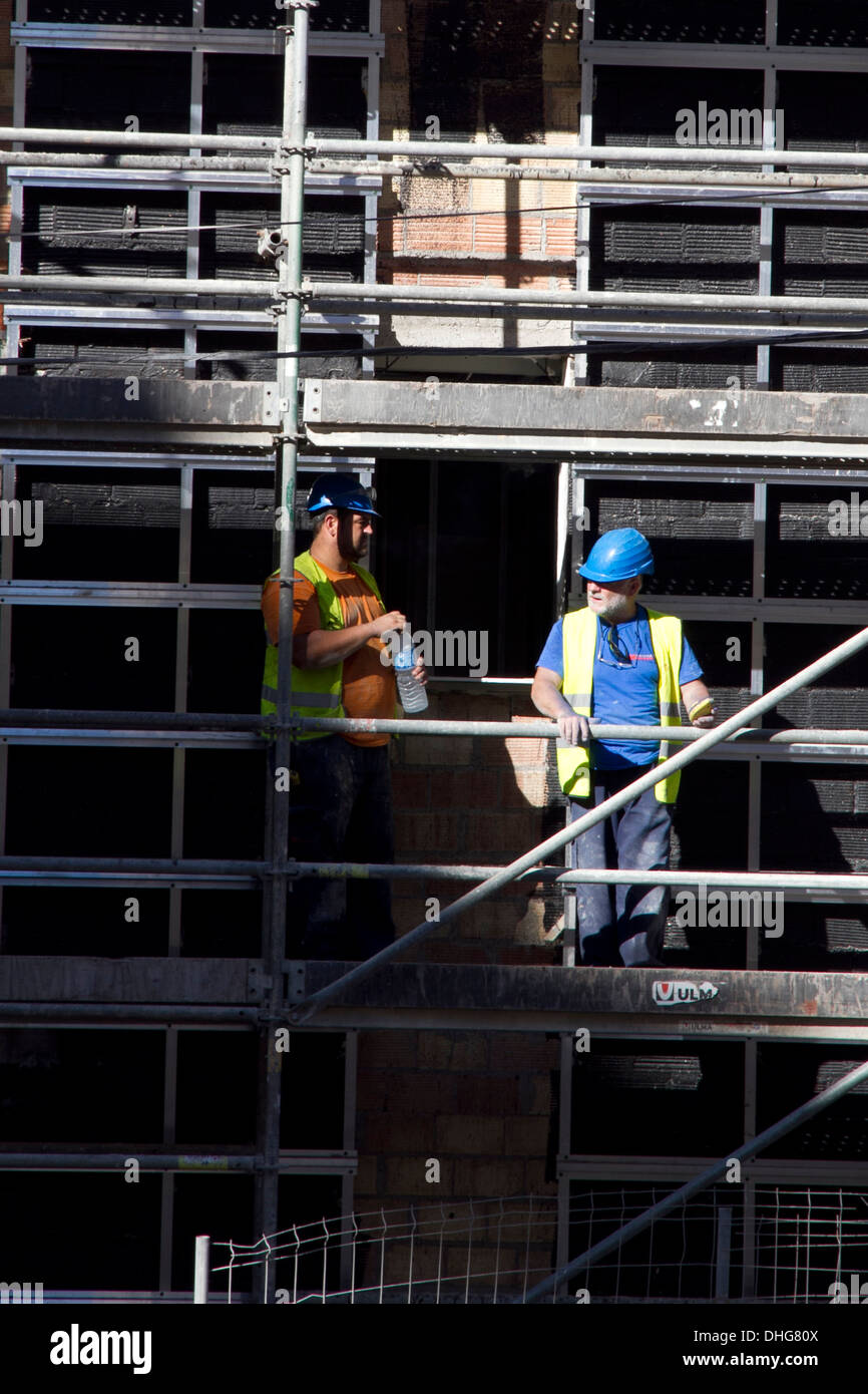 construction site workers edifice building Stock Photo - Alamy