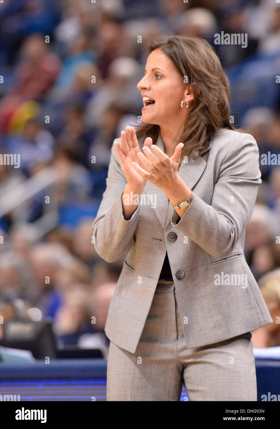 Hartford, CT, USA. 9th Nov, 2013. Saturday November 9, 2013: Hartford Hawks Head coach Jennifer Rizzotti applauds her team's play during the 1st half of the womens NCAA basketball game between Hartford and Connecticut at XL Center in Hartford, CT. UConn won easily over Hartford 89-34. Bill Shettle / Cal Sport Media. © csm/Alamy Live News Stock Photo