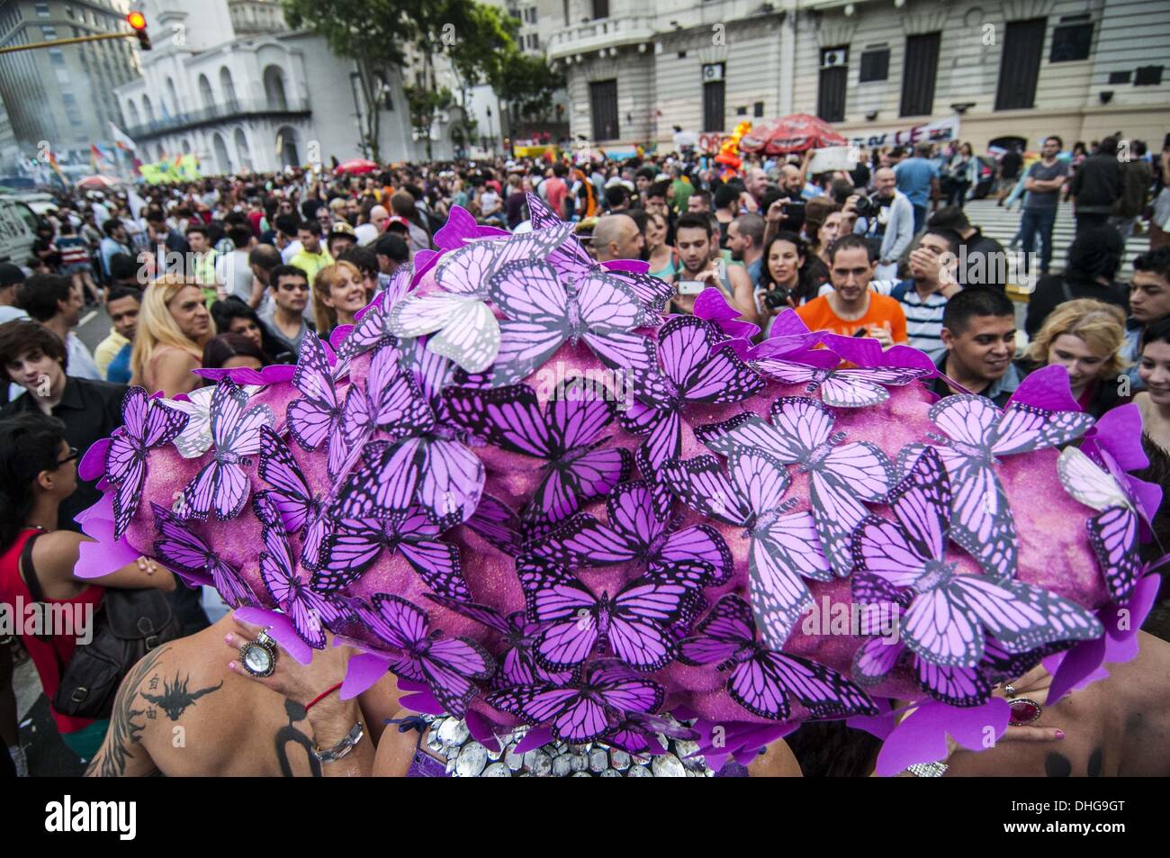 Buenos Aires, Buenos Aires, Argentina. 9th Nov, 2013. Wearing a butterfly wig, a man poses for pictures at the start of the XXII Buenos Aires LBGTIQ Pride Parade, which summoned, as each year, a crowd of tens of thousands who marched from Plaza de Mayo to the National Congress. © Patricio Murphy/ZUMAPRESS.com/Alamy Live News Stock Photo