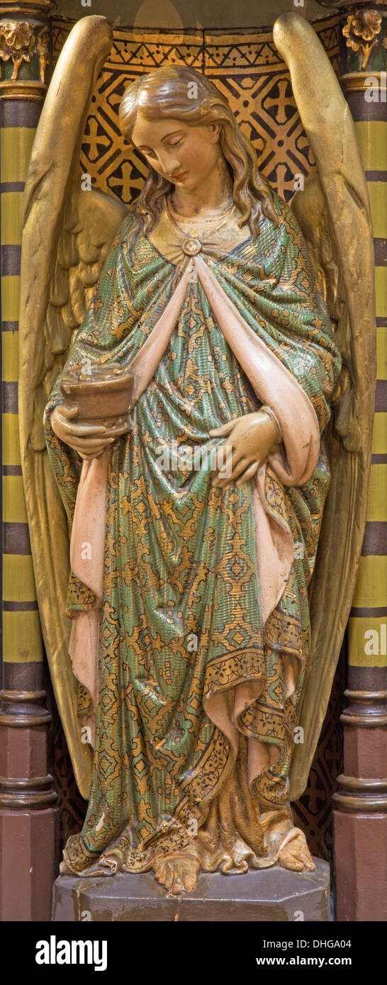 ANTWERP, BELGIUM - SEPTEMBER 5: Carved polychrome angel from pulpit of Joriskerk or st. George church Stock Photo