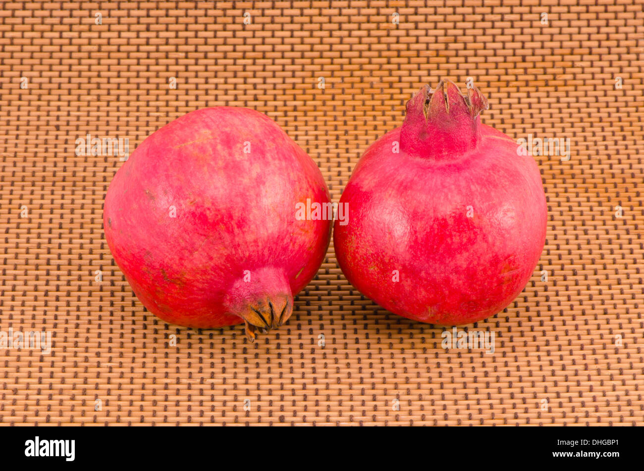 two ripe fresh pomegranate fruits Stock Photo
