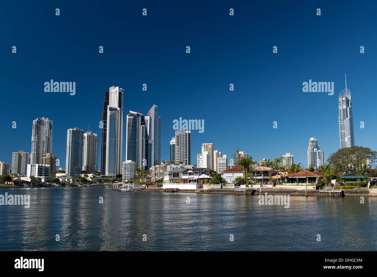 High rise apartment buildings, including Q1, viewed across the Nerang River. Stock Photo