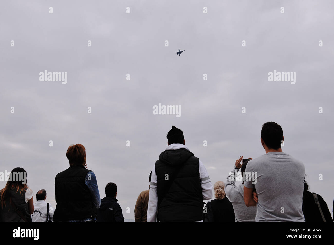 People watching the F-16 maneuvers over Thessaloniki Stock Photo