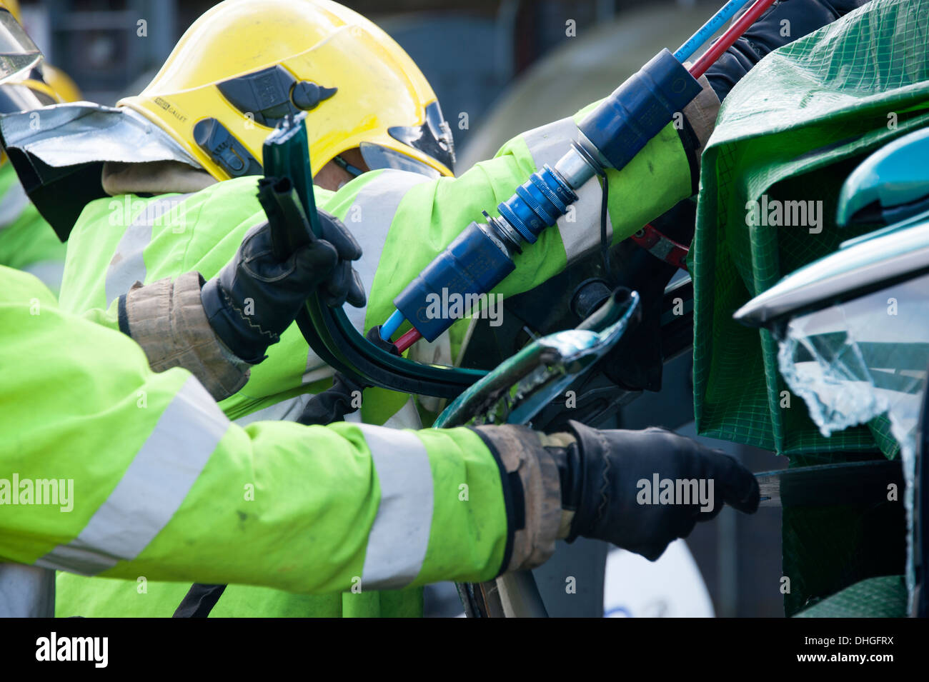 Firefighters roof removal gold standard extrication RTA RTC Stock Photo