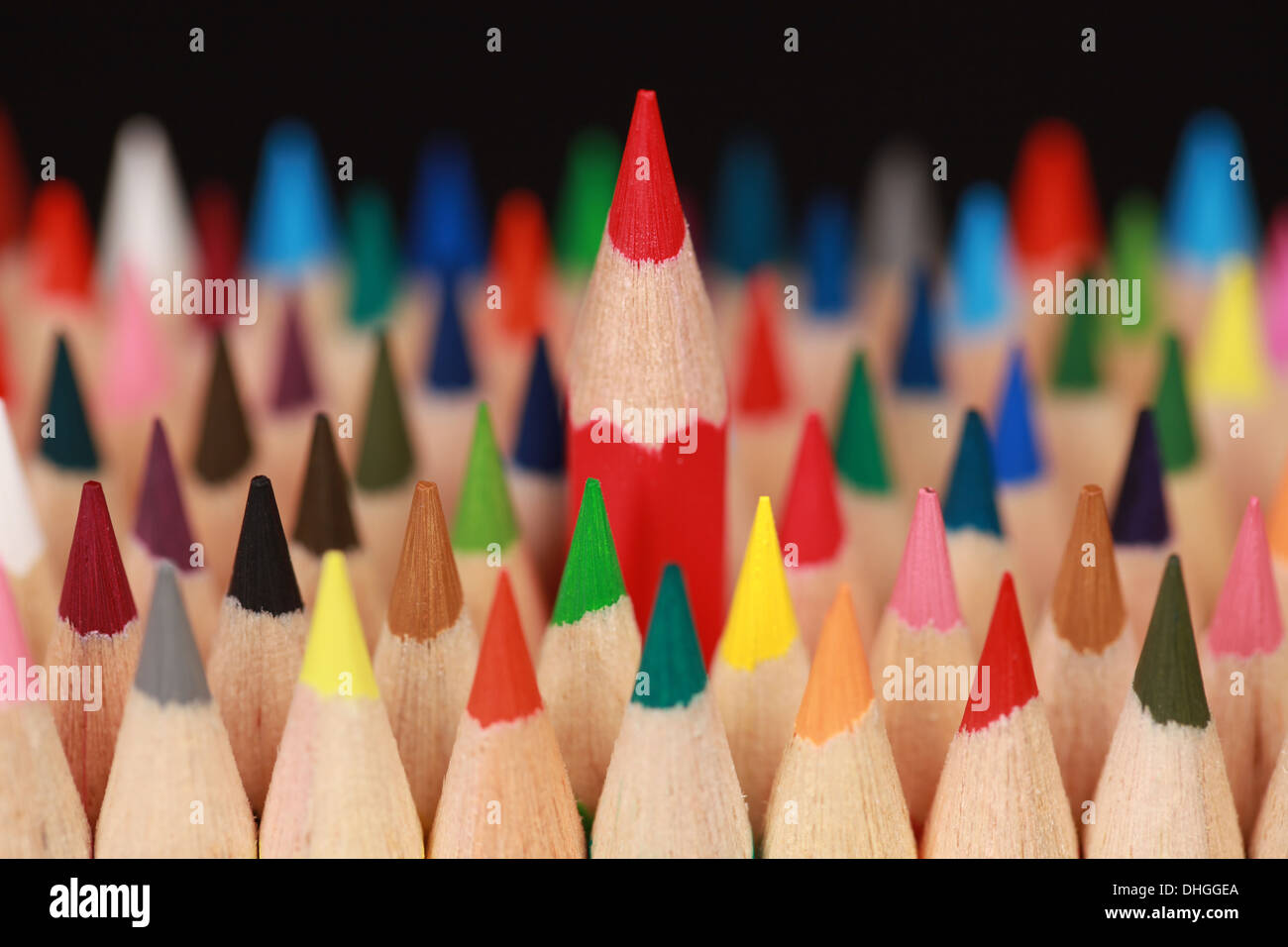Concept picture red pencil standing out from the crowd Stock Photo