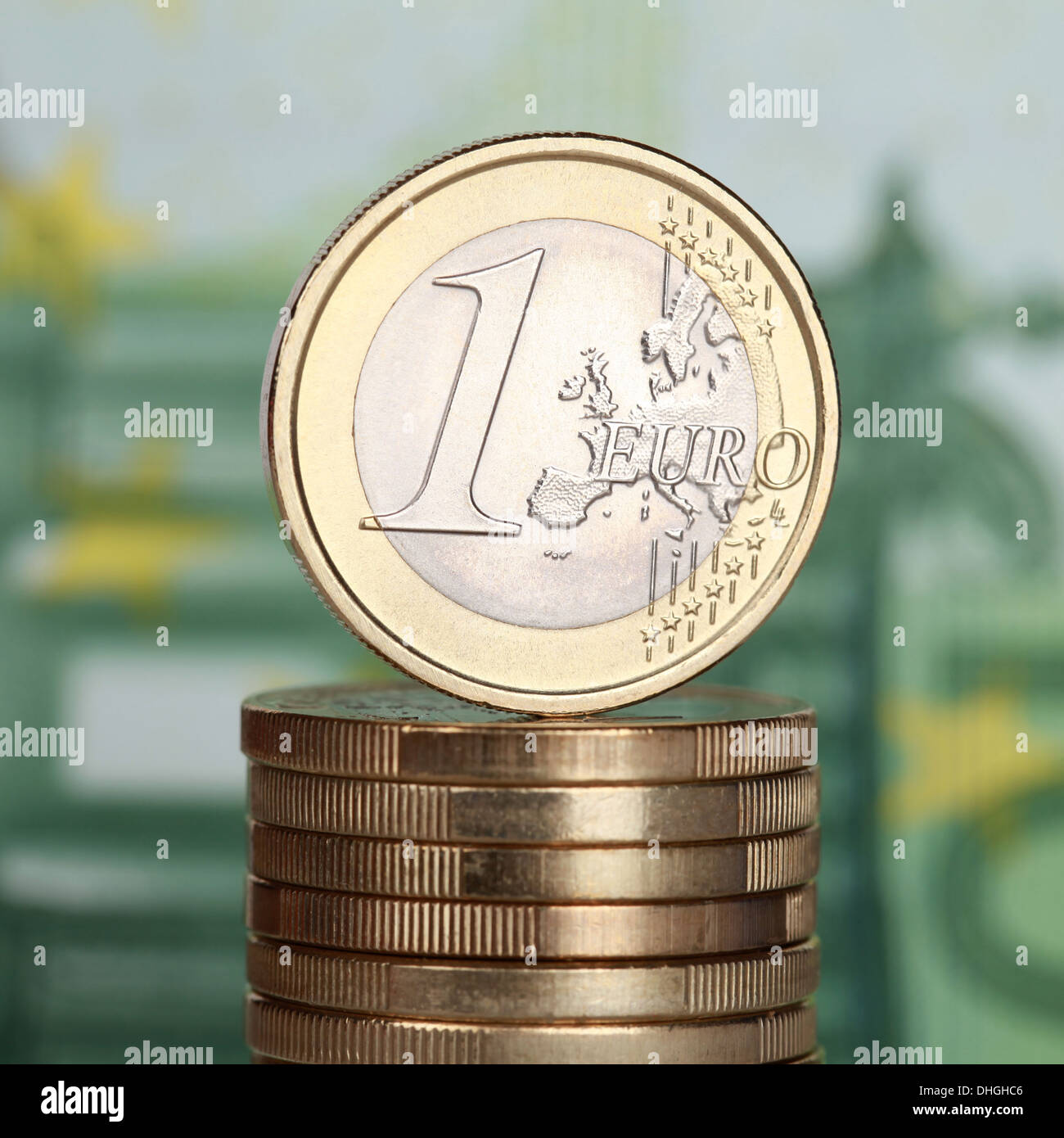 One Euro coin on a stack of many Euro coins Stock Photo