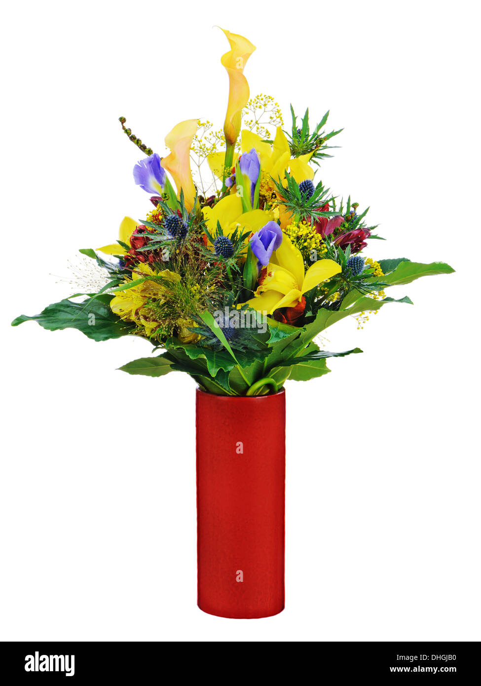 Colorful flower bouquet arrangement centerpiece in vase isolated on white background. Closeup. Stock Photo