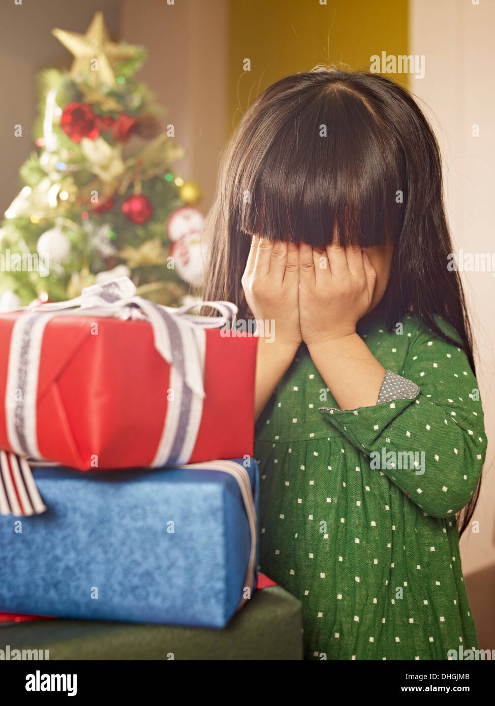 Little Asian girl and her Christmas presents Stock Photo