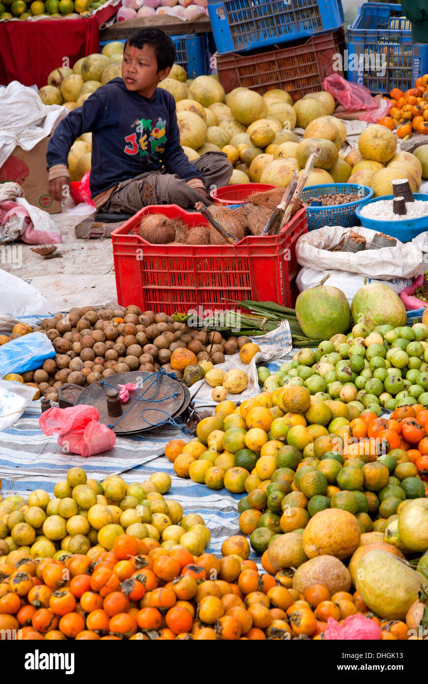 Fruit seller boy in Kathmandu, Nepal. Stock Photo