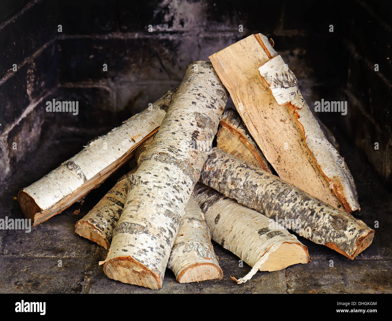 Fireplace with birch wood. Ready to light the flame Stock Photo Alamy