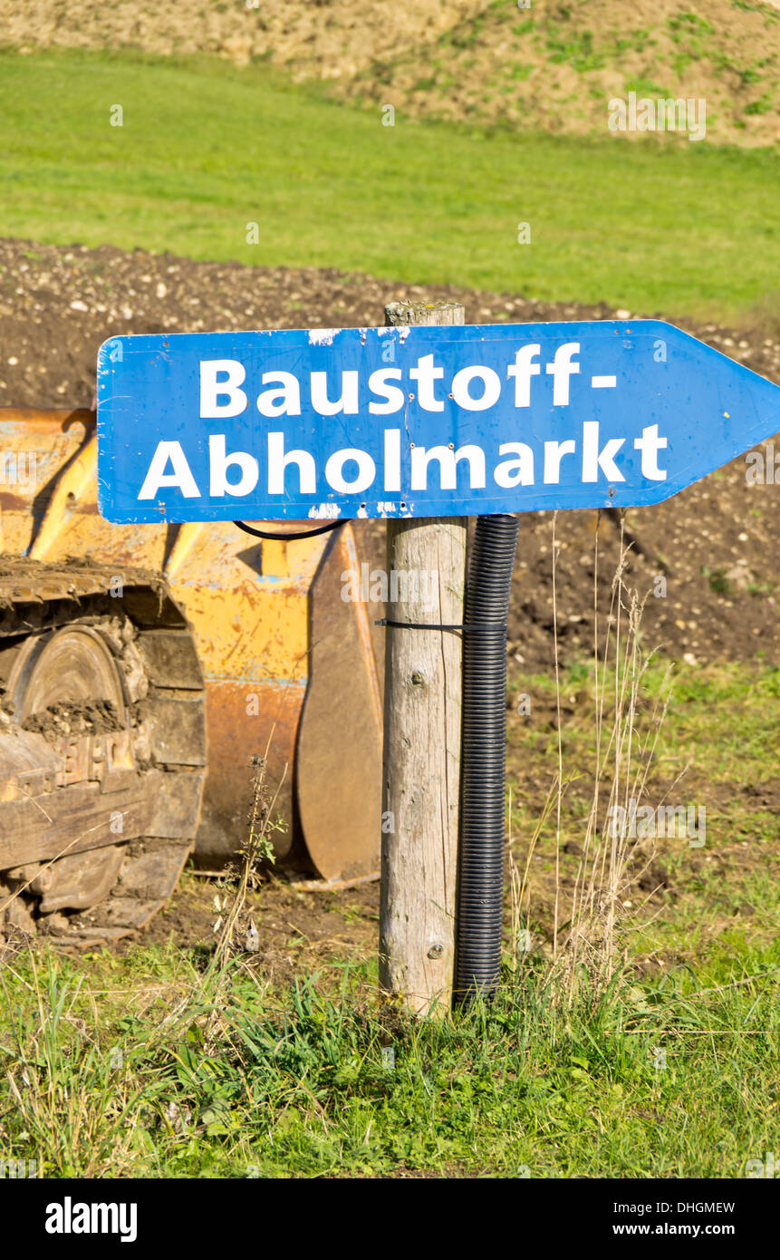 German Finger Post To The Construction Materials Market. Stock Photo