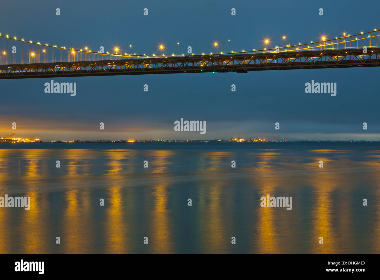 Dawn shot of the San Francisco Oakland Bay Bridge with Oakland and Alameda in the background. Stock Photo