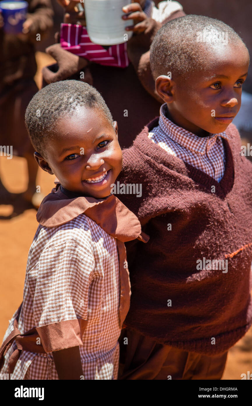 Smiling Kenyan boy and girl in a primary school in Sagalla in Southern Kenya Stock Photo