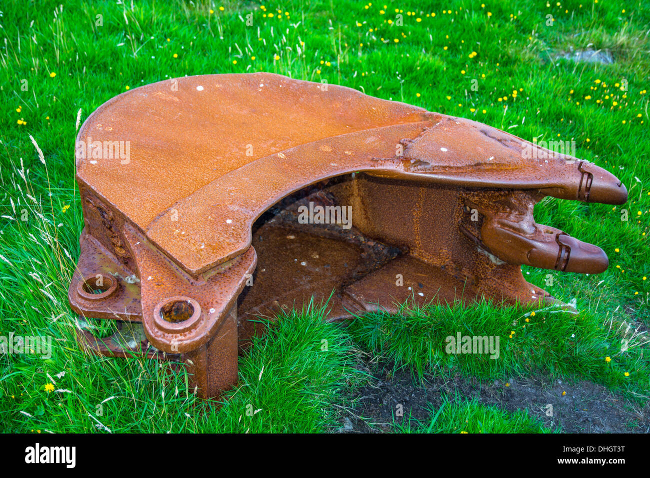Old Rusty Excavator Shovel In The Grass Stock Photo Alamy