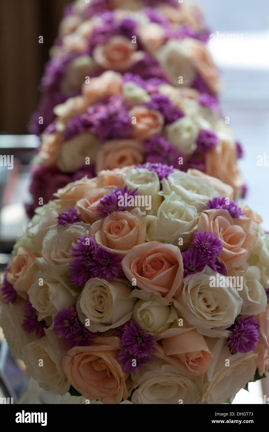 Wedding flower decoration bouquet rose pink red purple bunch depth field shallow focus pretty elegance marriage  beauty couple Stock Photo