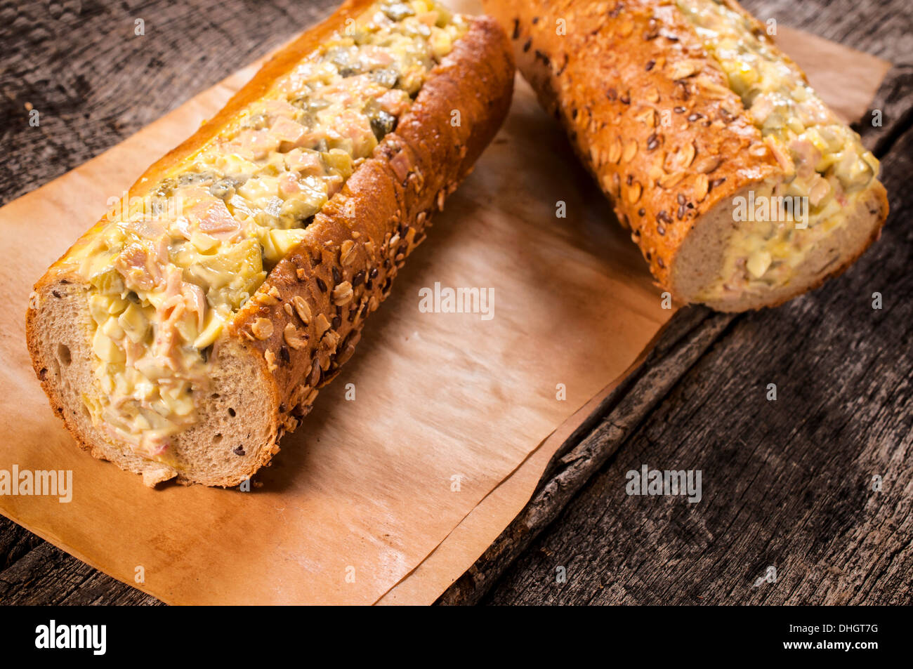 Two big sandwiches with Russian salad.Selective focus on the left sandwich  Stock Photo