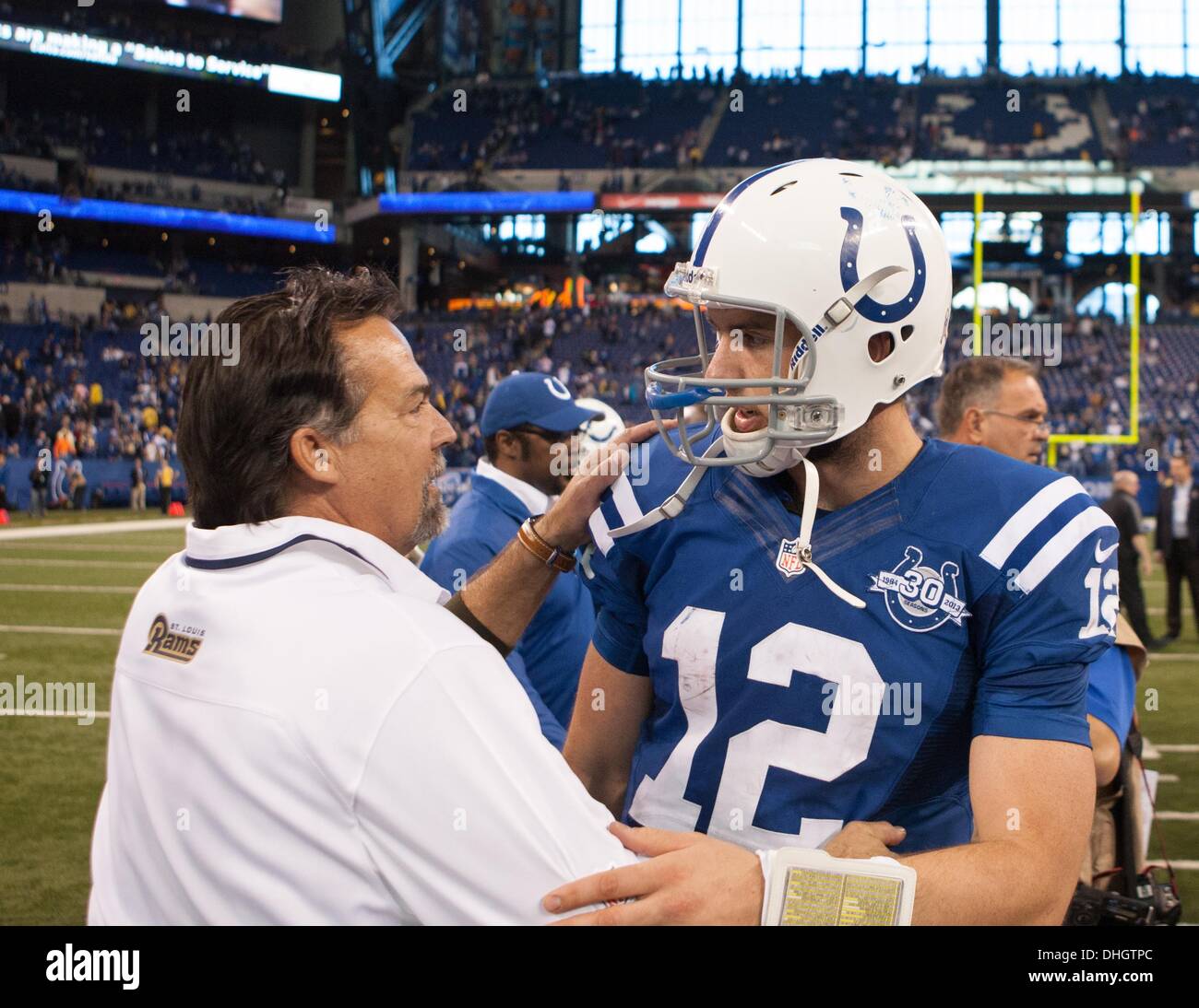 Oct. 10, 2013 - Indianapolis, OH, United States of America - November 10, 2013: Indianapolis Colts quarterback Andrew Luck (12) meets with St. Louis Rams head coach Jeff Fisher at midfield after the NFL game between the St. Louis Rams and the Indianapolis Colts at Lucas Oil Stadium in Indianapolis, IN. The St. Louis Rams defeated the Indianapolis Colts 38-8. Stock Photo