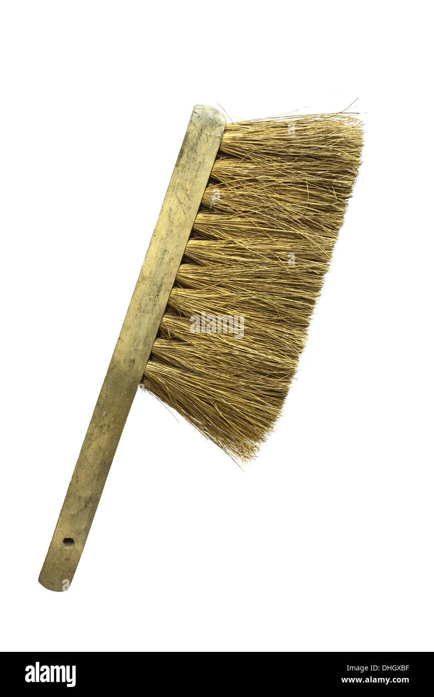 Hand sweeping brush isolated white background Stock Photo