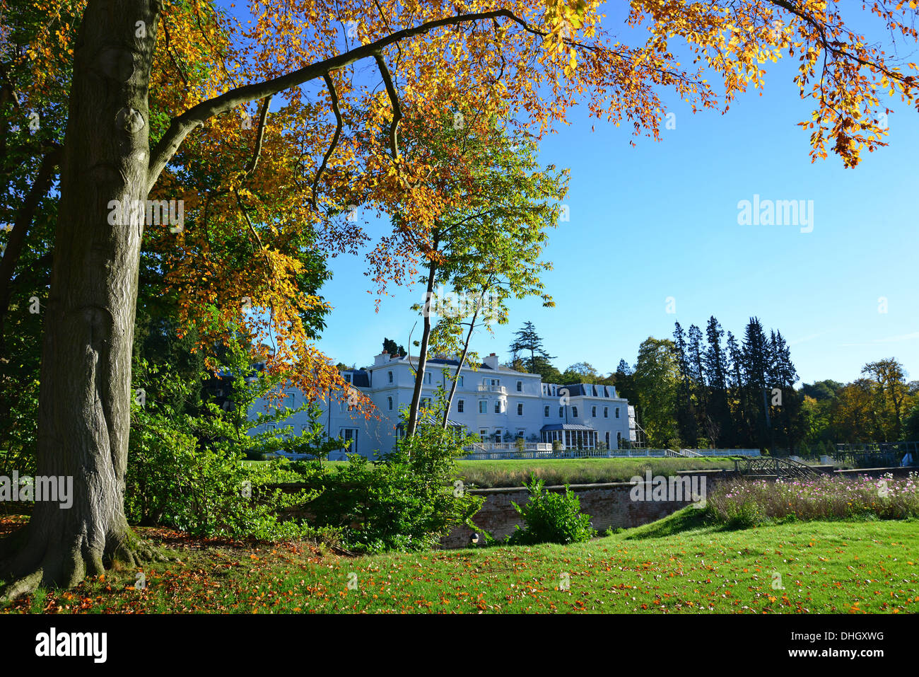 18th century Coworth Park Hotel in autumn, Blacknest Road, Ascot, Berkshire, England, United Kingdom Stock Photo