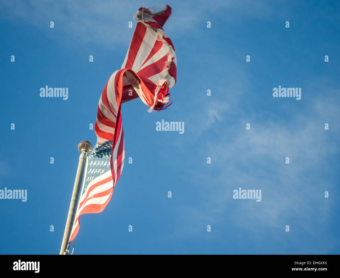 flag of the United States of America flying at the top of a flag pole ...