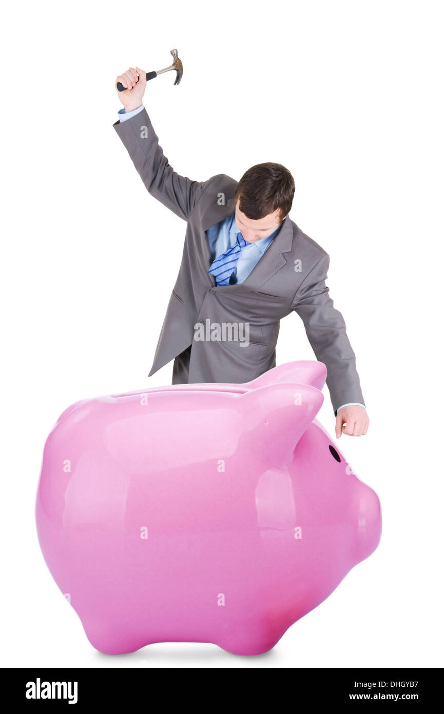 young businessman going to break the piggy bank isolated on white background Stock Photo
