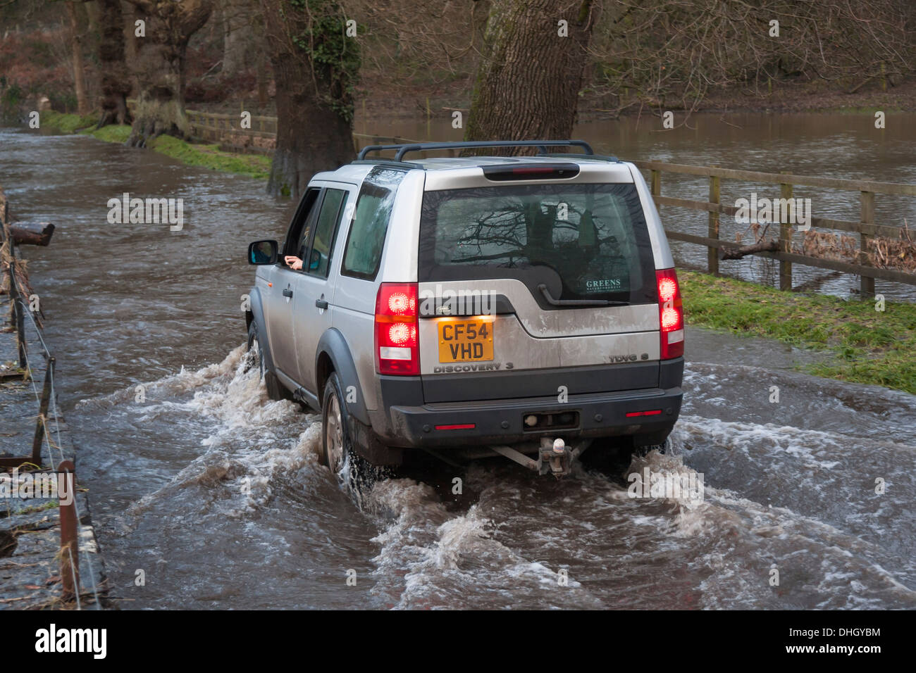 Land Rover driving through flood Stock Photo - Alamy