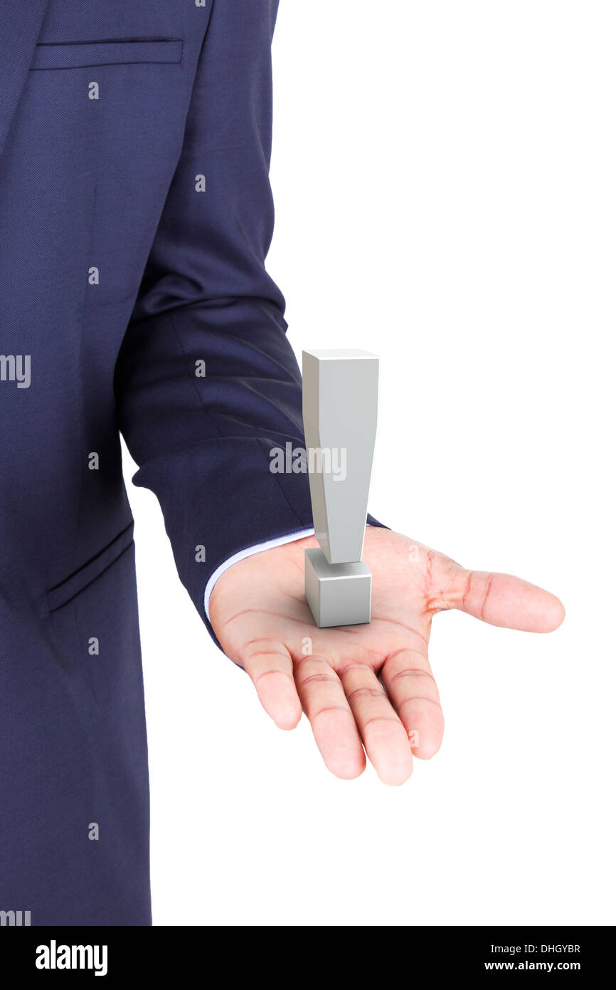 Business man holding a 3d exclamation mark in hand palm, isolated on white background Stock Photo