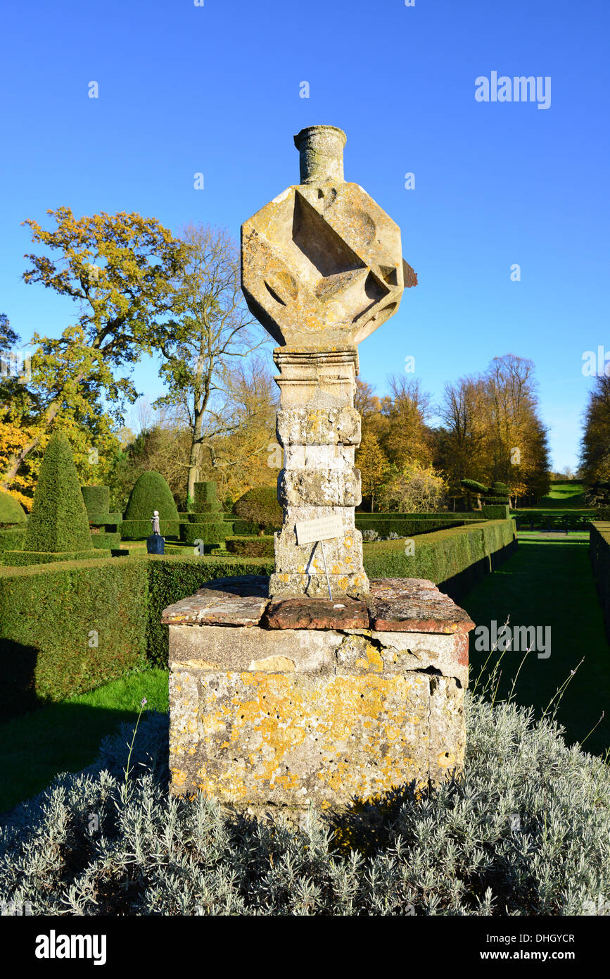Stone cross in historic walled garden at 15th century Great Fosters Hotel, Stroude Road, Egham, Surrey, England, United Kingdom Stock Photo