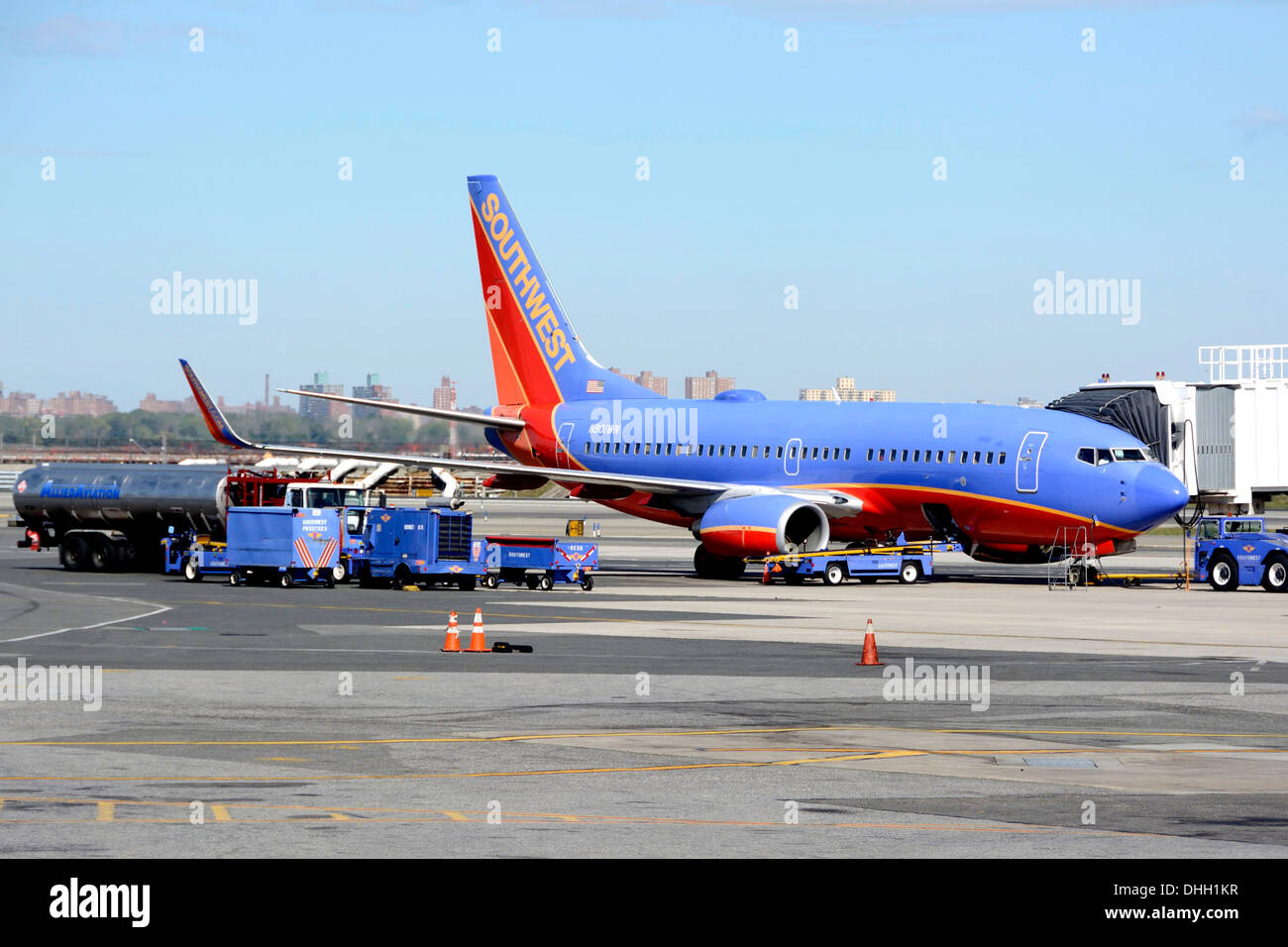 A Southwest airline 737 parks at the passenger gate at the LaGuardia Airport, New York, N.Y., October 12, 2013. Stock Photo