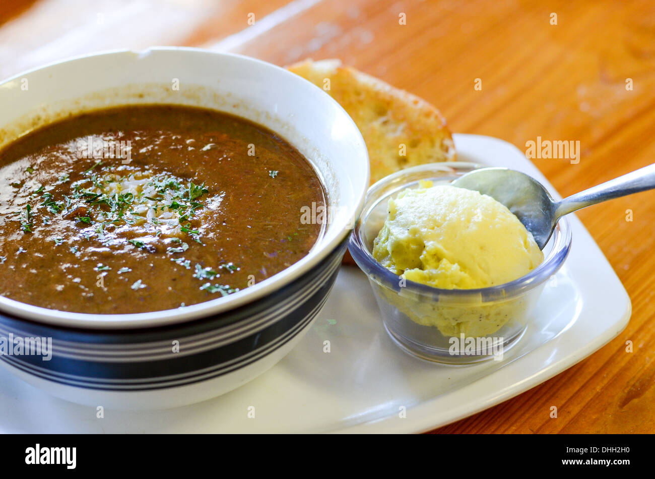 Traditional creole cajun gumbo with potato salad Stock Photo Alamy