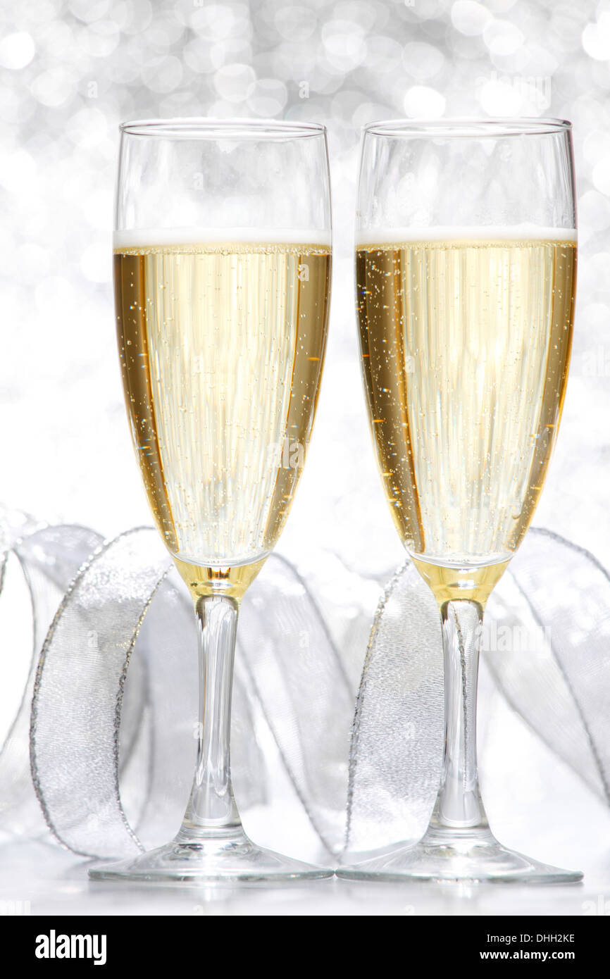 New year card with Champagne on shiny glitter background Stock Photo ...