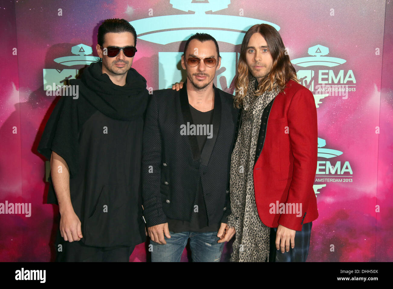 the Ziggo Dome, Amsterdam, the Netherlands. 10th Nov, 2013. Member of the US band 30 Seconds to Mars, (L-R) Tomislav Milicevic, Shannon Leto and Jared Leto arrive at the MTV Europe Music Awards 2013 ceremony in the Ziggo Dome, Amsterdam, the Netherlands, 10 November 2013. Photo: Hubert Boesl/dpa/Alamy Live News Stock Photo