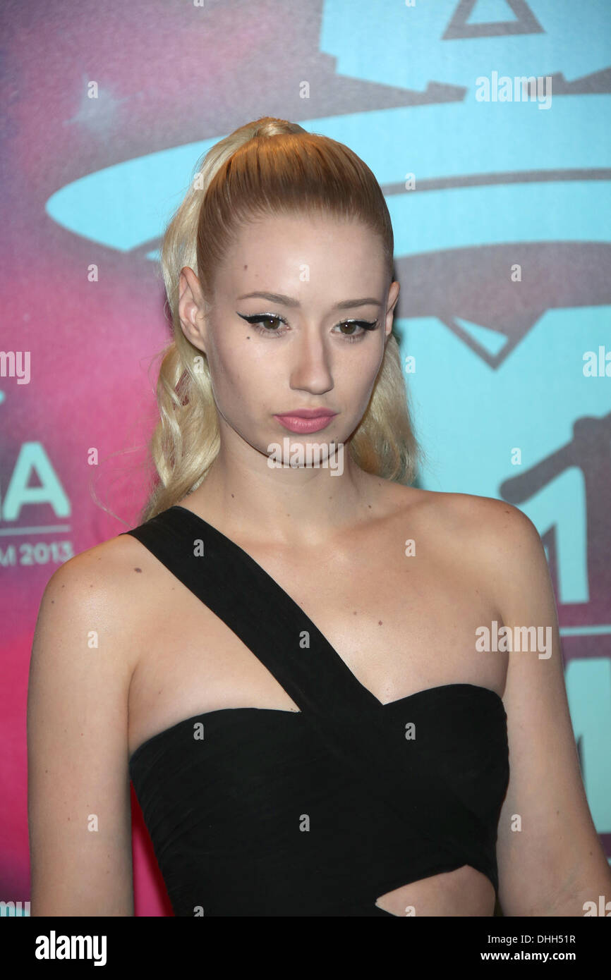 the Ziggo Dome, Amsterdam, the Netherlands. 10th Nov, 2013. Australian singer Iggy Azalea arrives at the MTV Europe Music Awards 2013 ceremony in the Ziggo Dome, Amsterdam, the Netherlands, 10 November 2013. Photo: Hubert Boesl/dpa/Alamy Live News Stock Photo