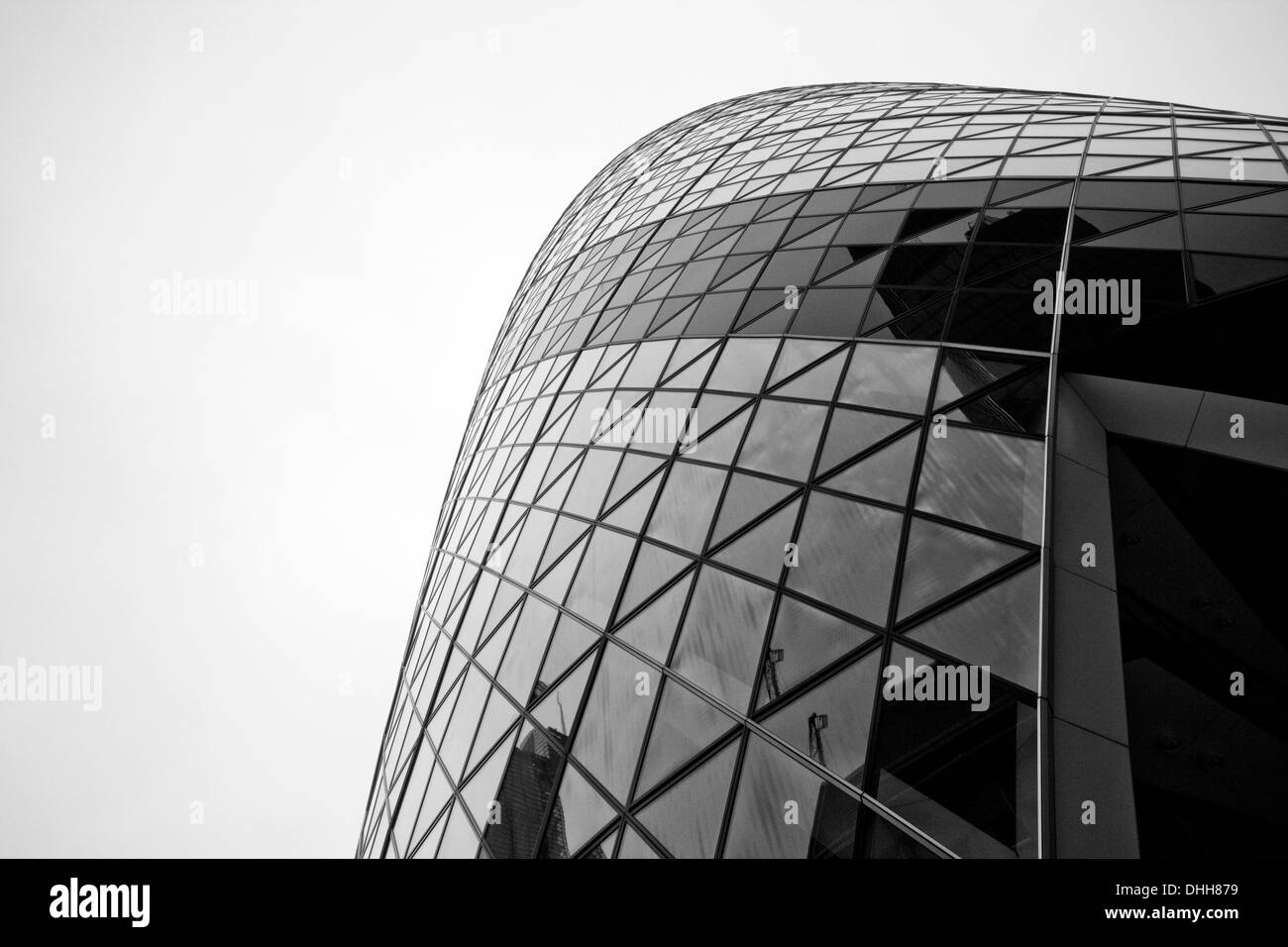 LONDON - SEPTEMBER 21: The modern glass buildings of the 30 St Mary Axe, Swiss Re, Gherkin September 21, 2013 Stock Photo