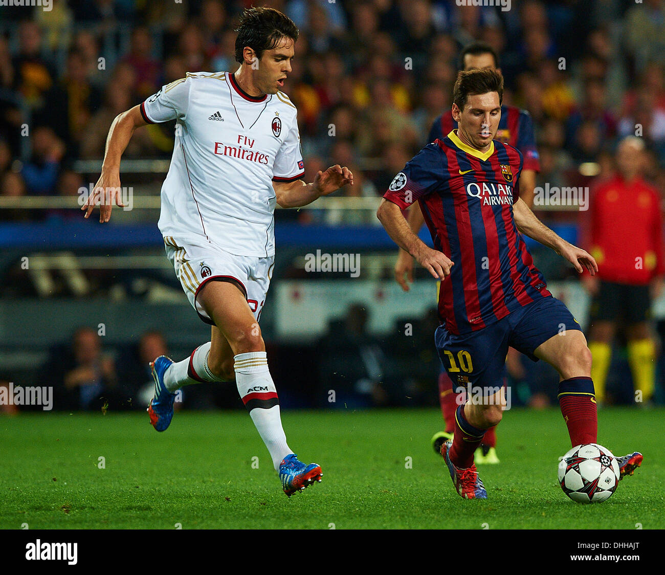Kaka (AC Milan) duels for the ball against Lionel Messi (FC Barcelona), during the Champions League soccer match between FC Barcelona and AC Milan, at the Camp Nou stadium in Barcelona, Spain, wednesday, november 6, 2013. Foto: S.Lau Stock Photo