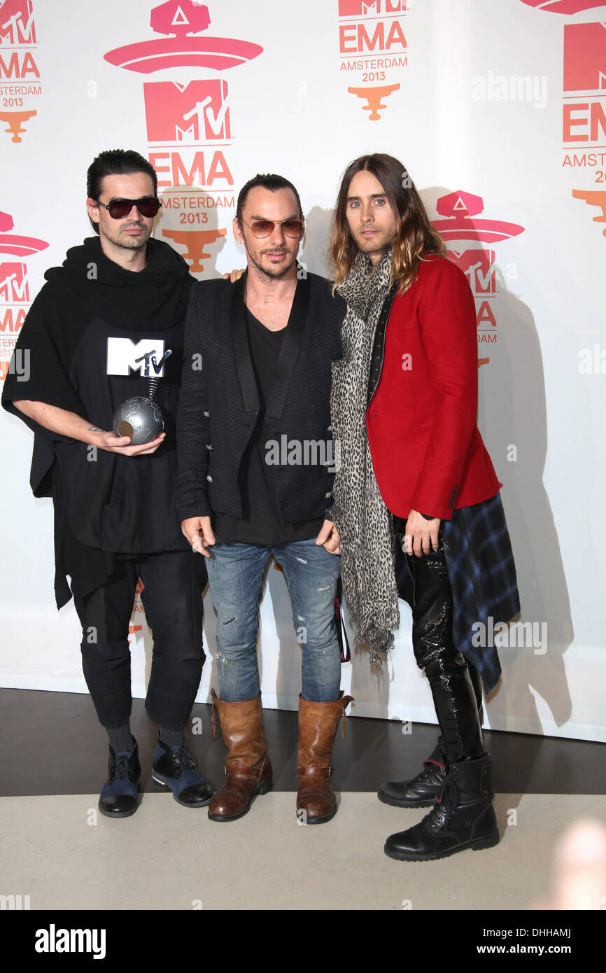 Amsterdam, The Netherlands. 10th Nov, 2013. Member of the US band 30 Seconds to Mars, (L-R) Tomislav Milicevic, Shannon Leto and Jared Leto pose with their award for Best Alternative Act at the MTV Europe Music Awards (EMA) 2013 held at the Ziggo Dome in Amsterdam, The Netherlands, 10 November 2013. Photo: Hubert Boesl/dpa/Alamy Live News Stock Photo