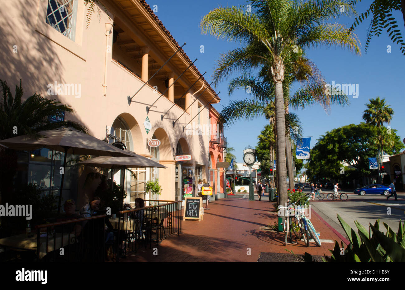 Santa Barbara California CA on famous State Street in Old Town and old Clock on boardwalk with palms and restaurants Stock Photo