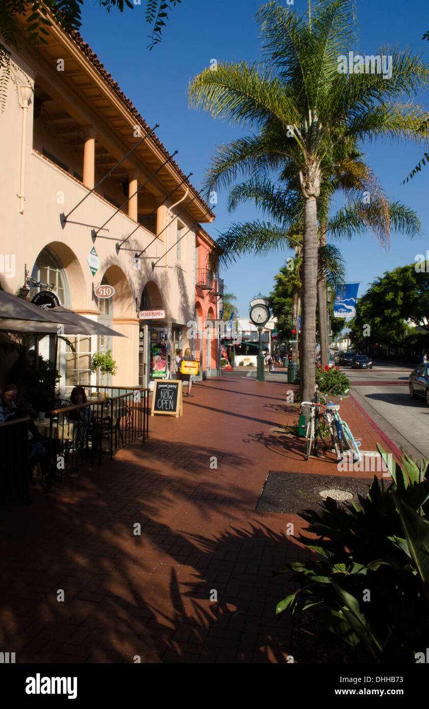 Santa Barbara California CA on famous State Street in Old Town and old Clock on boardwalk with palms and restaurants Stock Photo