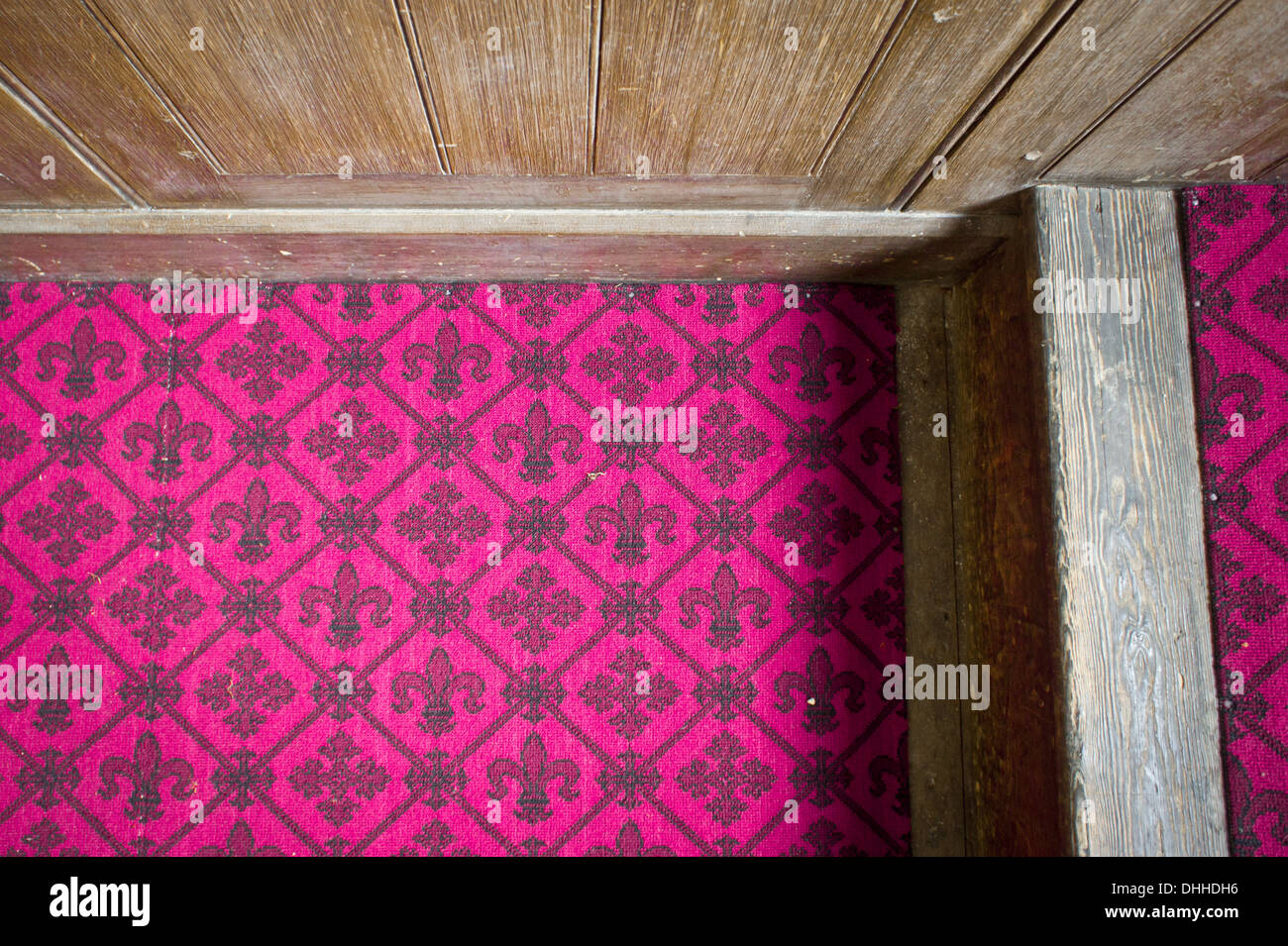 Pink Floral Carpet And A Wooden Wall Stock Photo Alamy