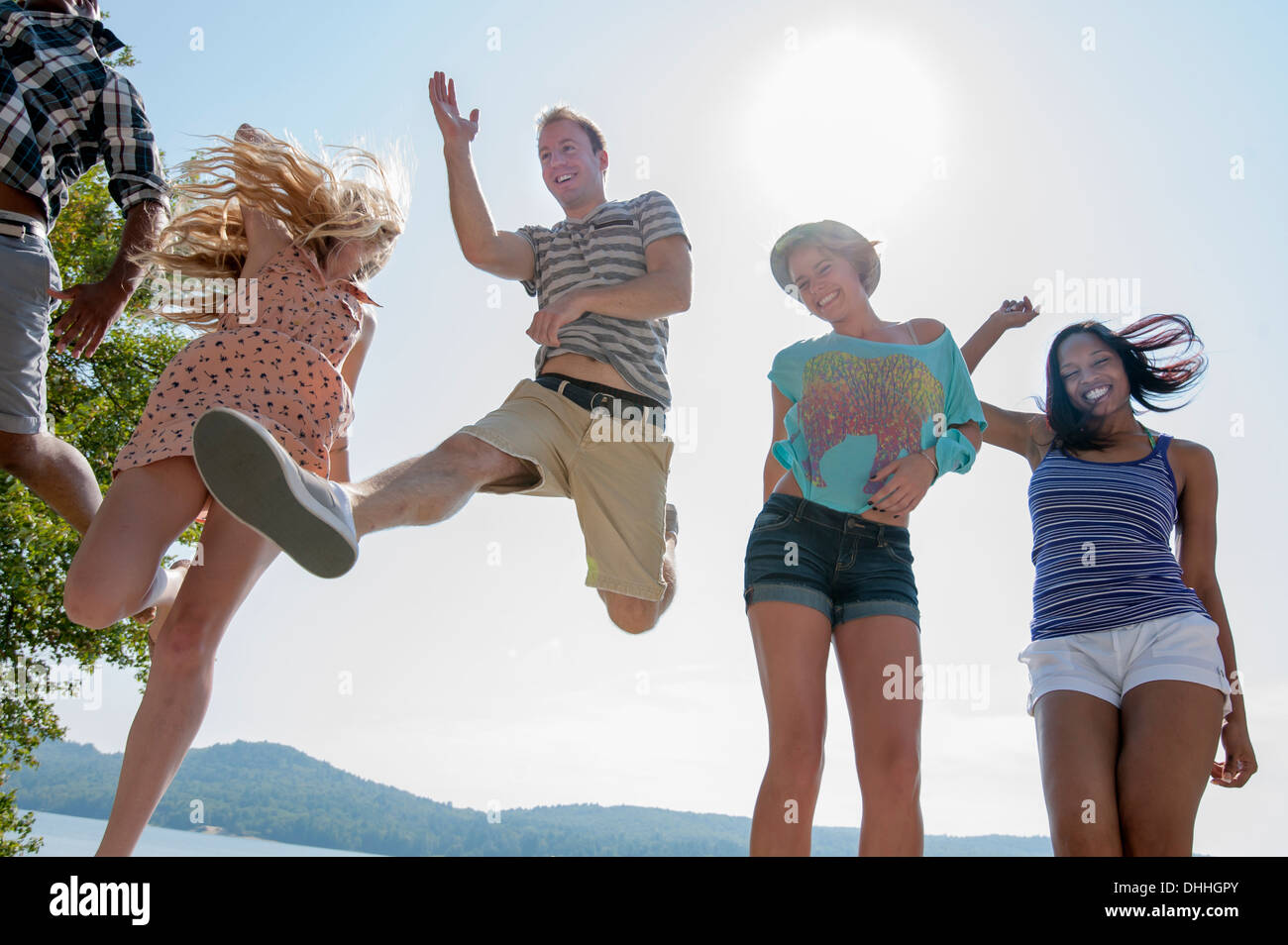 Group of friends wearing summer clothes, low angle Stock Photo