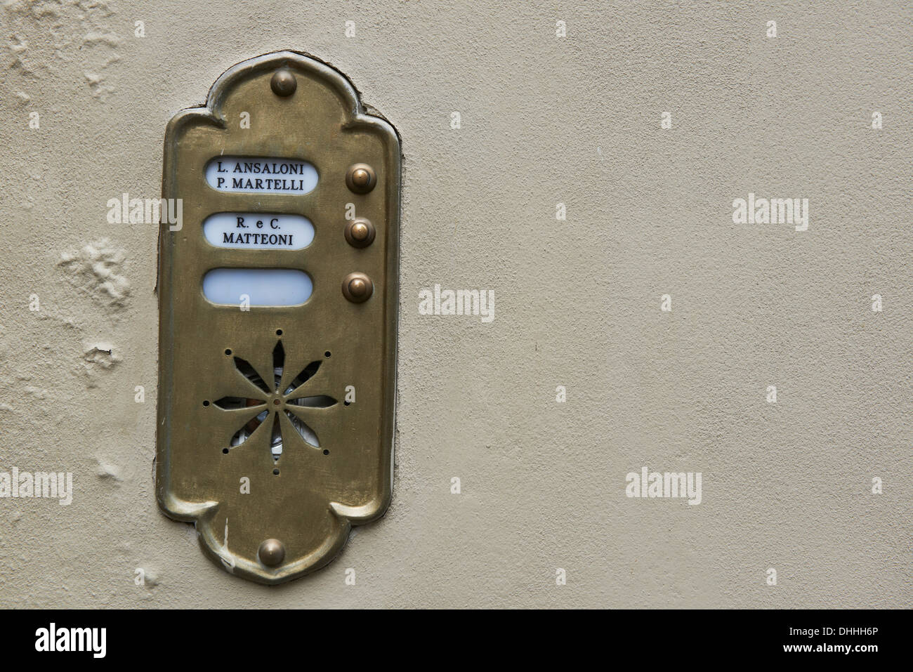 Old Fashioned Brass Door Bell Intercom On A Wall Stock Photo