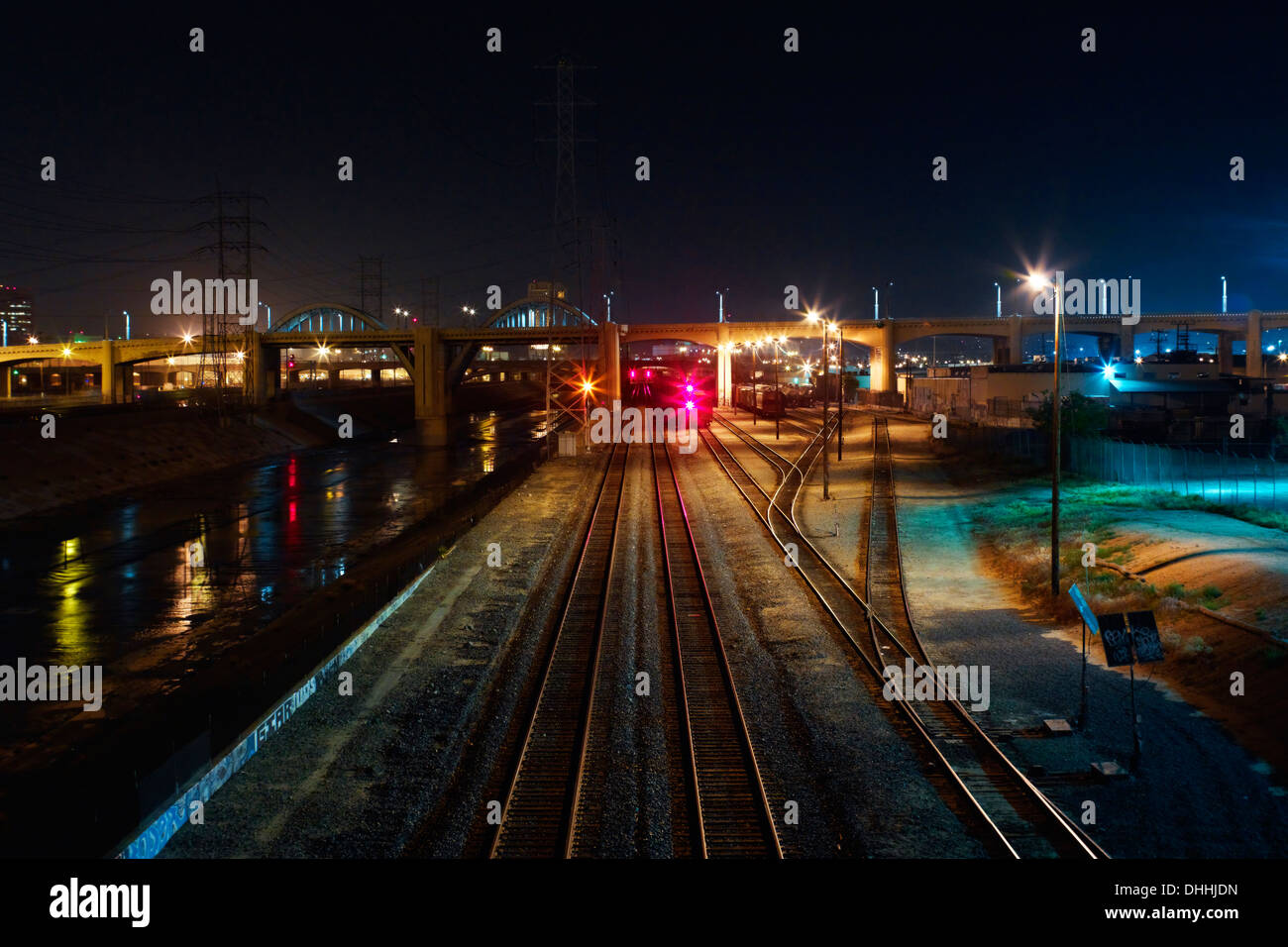 Bridge and rail track at night, Los Angeles, California, USA Stock Photo