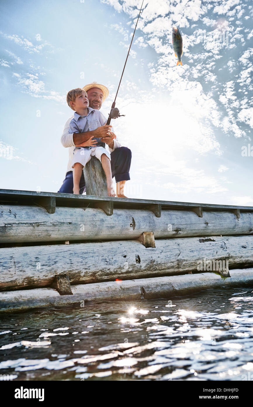 Father and son fishing, Utvalnas, Sweden Stock Photo