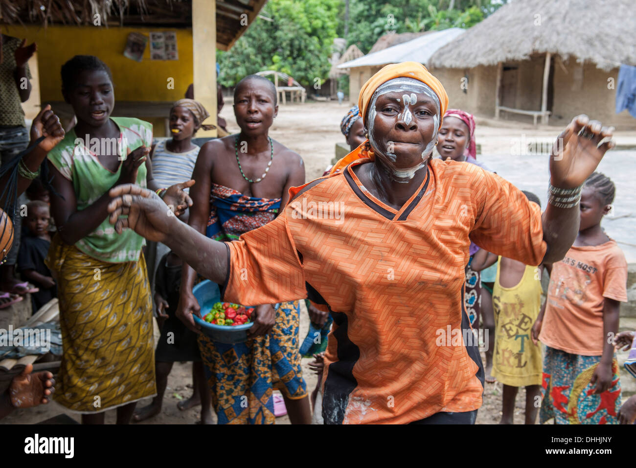 Villagers celebrating a festival with traditional dance and music, Tiwai Island, Southern Province, Sierra Leone Stock Photo