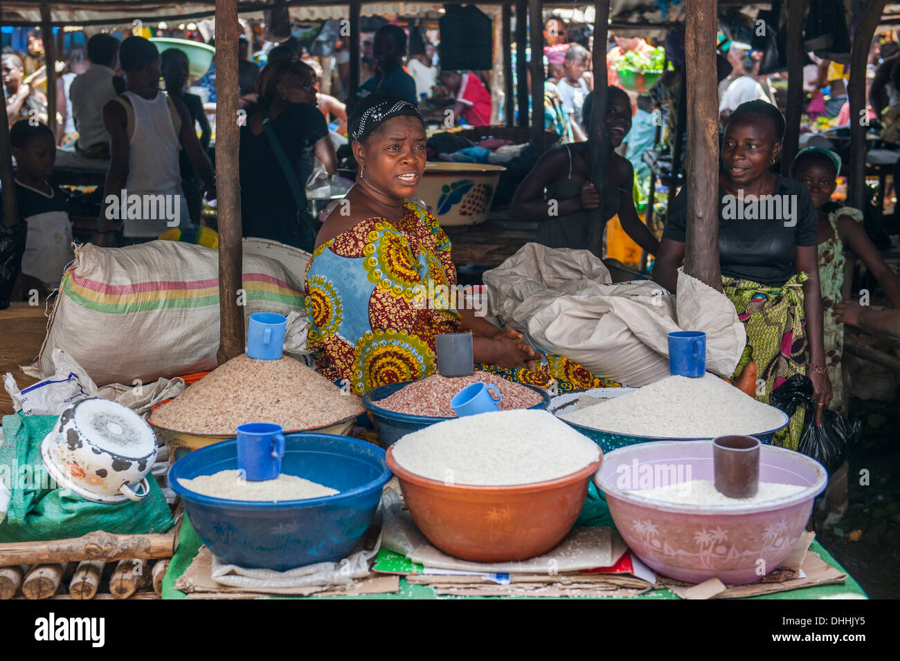 Grain seller at a street market, Bo, Southern Province, Sierra Leone Stock Photo