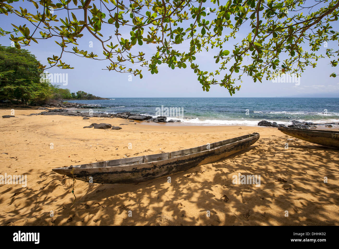 Dugout on the sandy beach, Banana Islands, Western Area, Sierra Leone Stock Photo